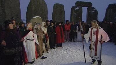 People celebrating the winter solstice at Stonehenge