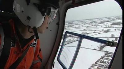 Crew member looking out of the air ambulance