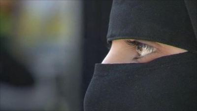 Syrian woman with face cover