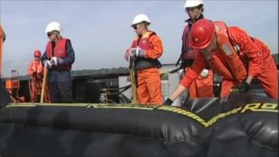 A team in Southampton practice stemming the flow of an oil spill