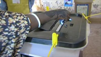 Woman casting her vote