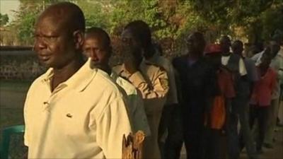 People queuing to vote