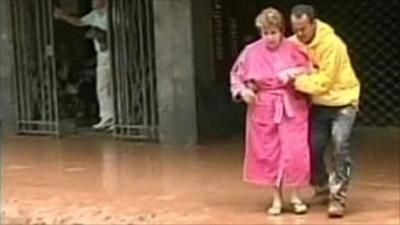 Woman helped through flood damage