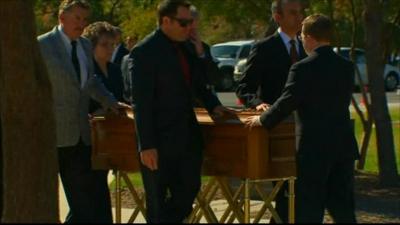 Christina's coffin being wheeled into church