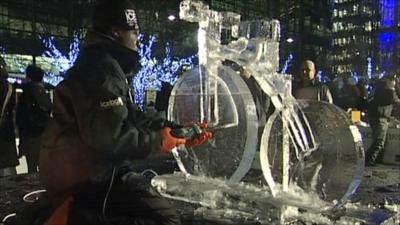 Artist creates ice sculpture