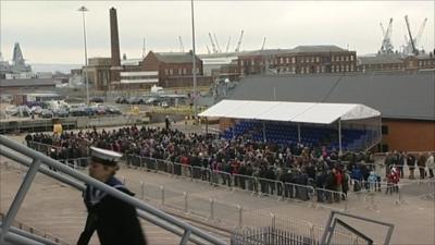 Fans of the Ark Royal queue to see the ship