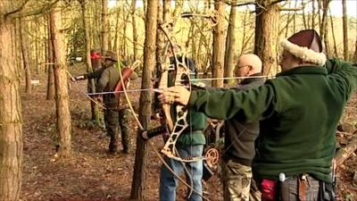 Archers in woodland