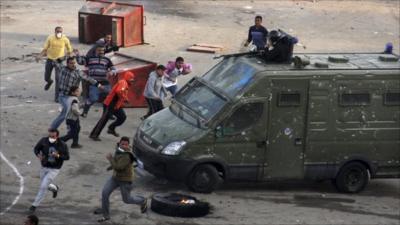 Protesters clash with police in Suez