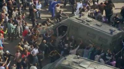 Protesters attack riot van