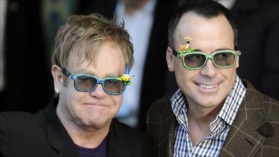 Elton John (L) and David Furnish (R)