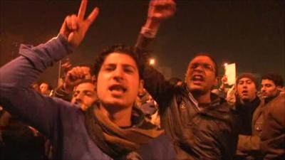 Protesters watch Mubarak's speech