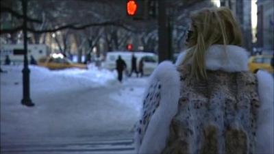 Woman wearing a fur coat