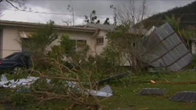 House with part of it's roof blown off