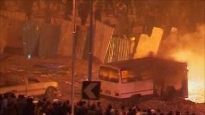 Burning bus on Tahrir Square