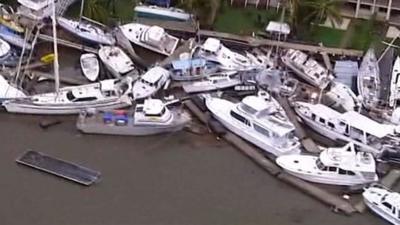 Boats lifted from water by cyclone