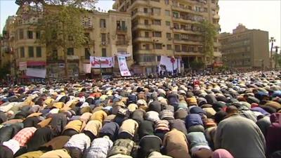 Protesters praying