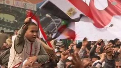 Child with flag in Cairo