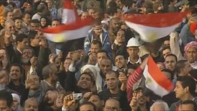 Protesters waving flags