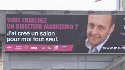 Billboard poster of French businessman Alain Gutton