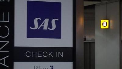 SAS check in sign