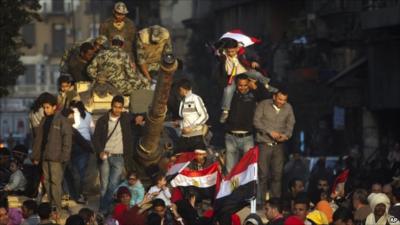 Tank and protesters