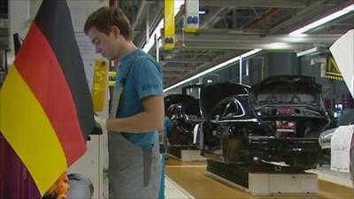 A worker in a German car factory