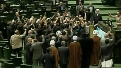 Members of Iran's parliament