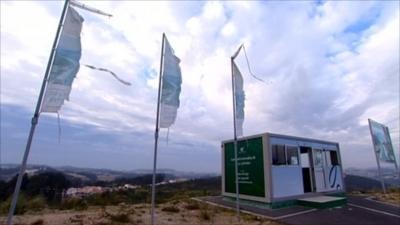 Tattered flags at abandoned development