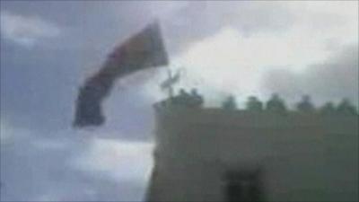 Amateur video purportedly showed the flag of independence being raised in Benghazi
