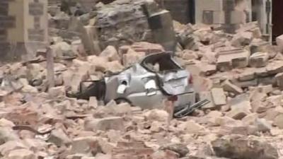 Car buried under rubble in Christchurch