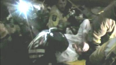 Earthquake victim being rescued