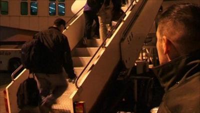 French passengers board aircraft