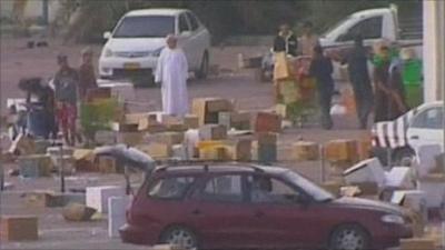 Looters at supermarket