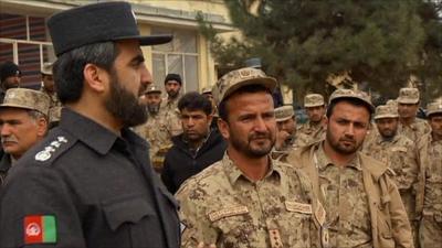 Afghan police fighting Taliban