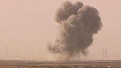 Smoke plume after air attack at Ajdabiya, Libya