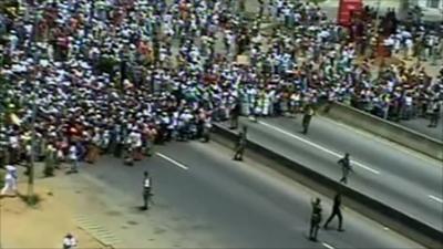 Protesters and armed forces in Abidjan