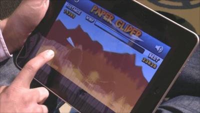 Paper Glider video game on an iPad