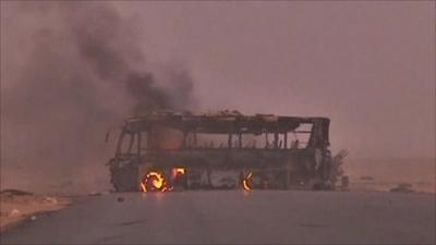 Burning bus in Libya