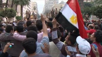 Protesters outside a building belonging to the state security service