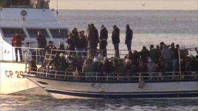 Migrants arrive at Italian island from north Africa