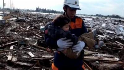 Man rescuing baby