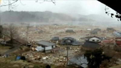 Tsunami washes away homes