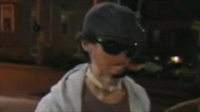 Image of disfigured construction worker walking into hospital prior to operation