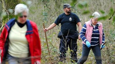 Volunteers searching Savernake Forest, near Marlborough, for signs of Miss O'Callaghan on Tuesday.