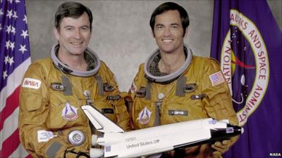 Columbia crew John Young and Bob Crippen with a model of the shuttle