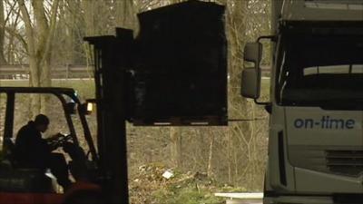 Forklift truck loading a large lorry