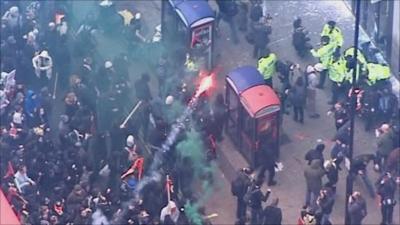 Protesters in Oxford Street get into a scuffle with police