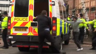 Members of the public attacking the police van carrying Christopher Halliwell