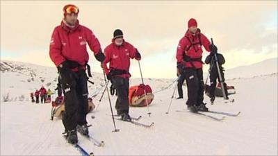 Servicemen on skis