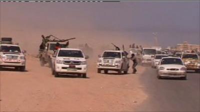 Rebels flee Gaddafi forces near Bin Jawad